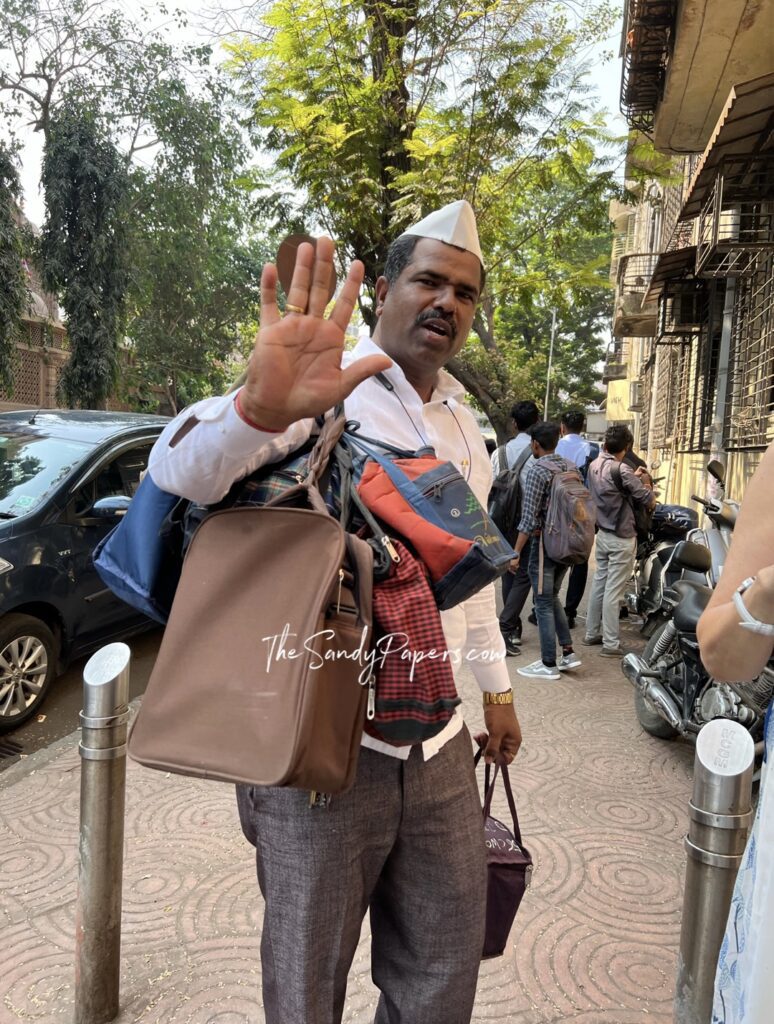 A simple teal paper airplane icon with black outlines.