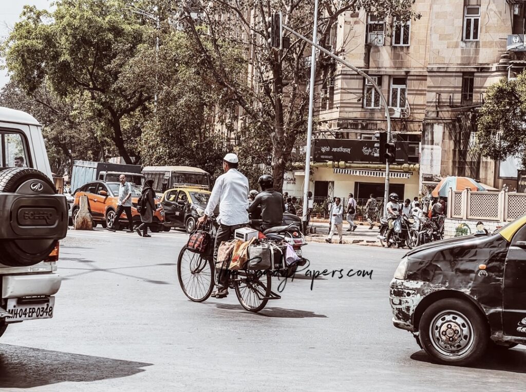A simple teal paper airplane icon with black outlines.